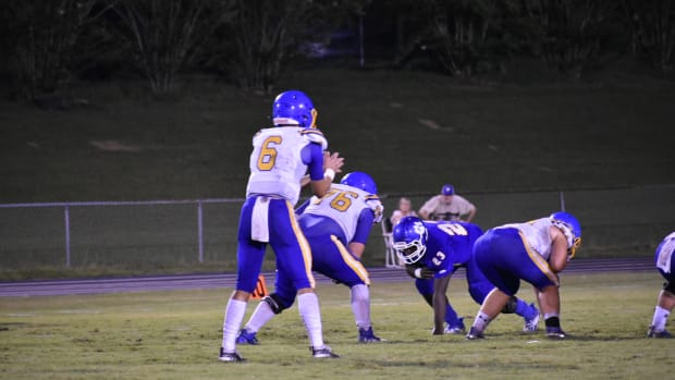 Ty Simpson awaits the snap.
